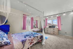 Bedroom featuring carpet floors