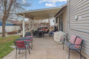 View of patio / terrace with outdoor dining space and an outdoor living space
