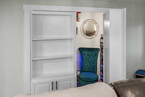 Living area featuring a textured wall