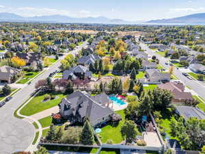 Aerial view of residential area featuring mountains