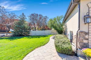 View of fenced backyard