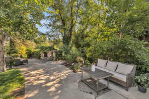 View of patio with an outdoor hangout area