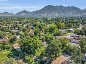 Aerial view of residential area featuring a mountain backdrop