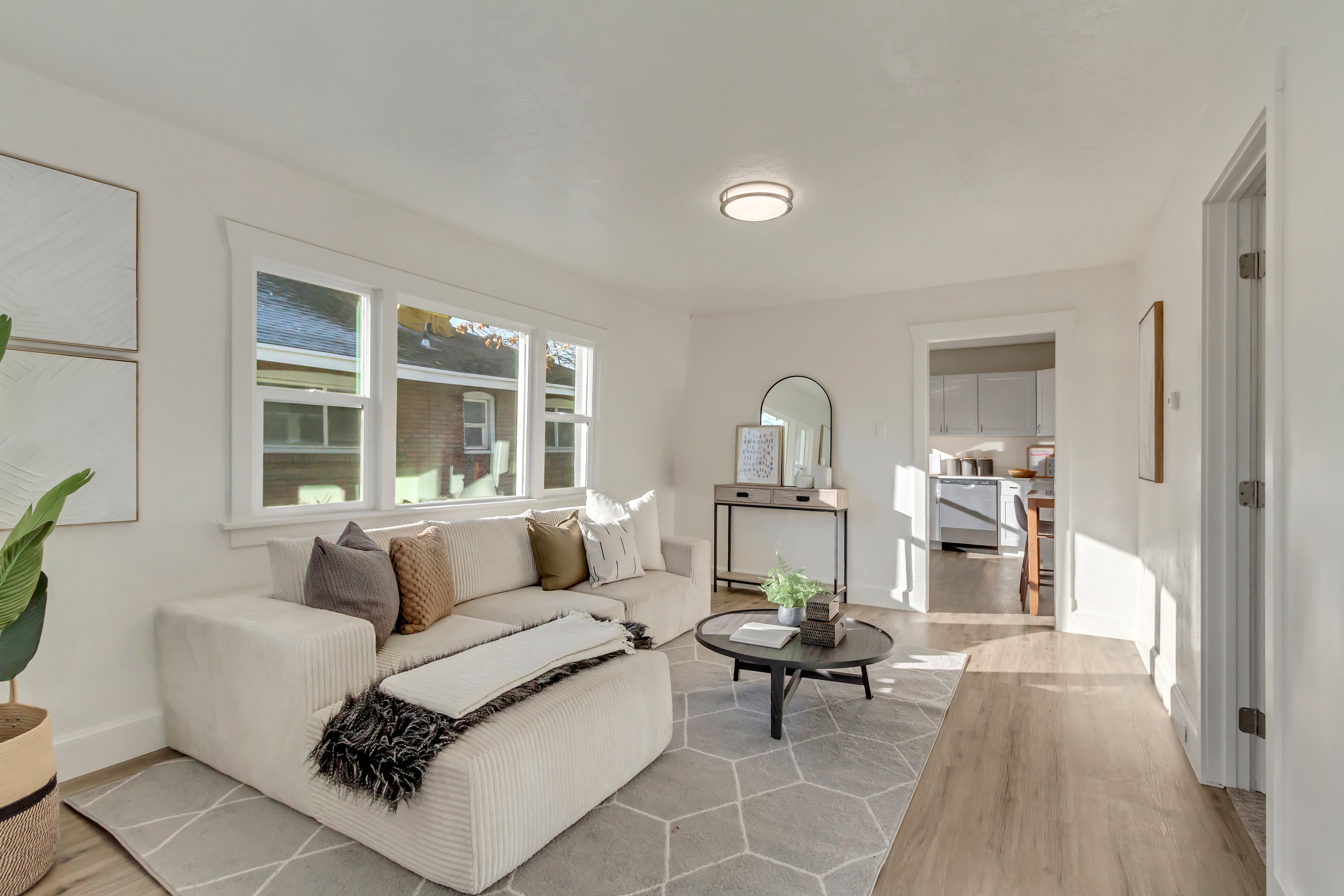 Living room with wood finished floors and baseboards