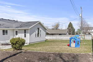 View of yard featuring a playground