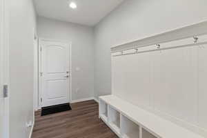 Mud room off garage with storage and coat hooks
