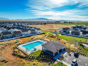 Aerial perspective of suburban area with a pool area