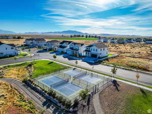 Aerial view of residential area featuring mountains