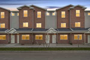 Traditional home with brick siding