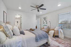 Primary Bedroom featuring carpet, ceiling fan, ensuite bathroom, and recessed lighting