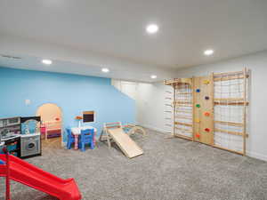 Playroom featuring carpet flooring and recessed lighting