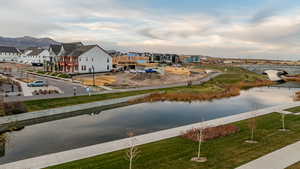 Water view with nearby suburban area