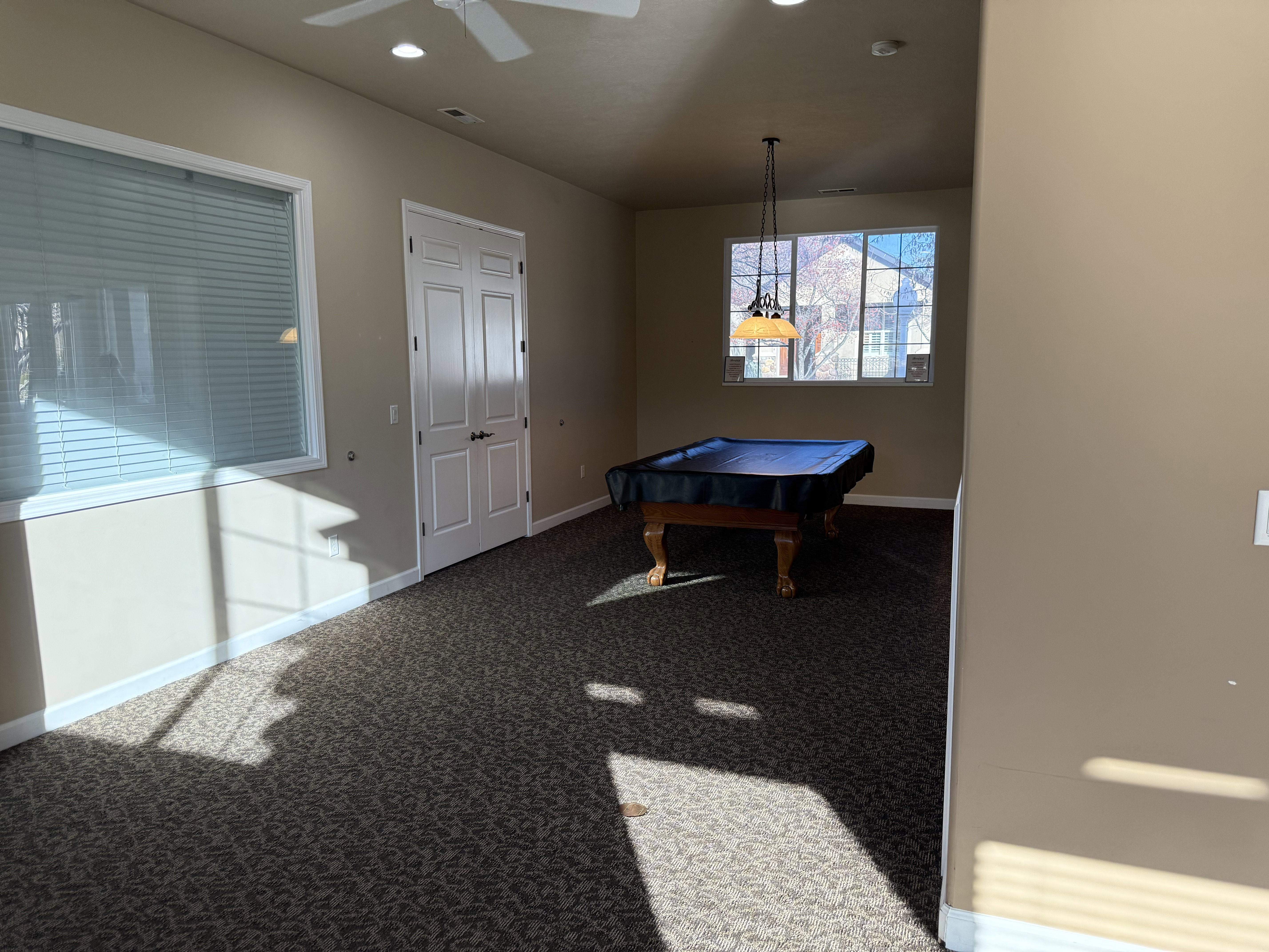 Clubhouse recreation room featuring pool table, carpet floors, recessed lighting, and a ceiling fan