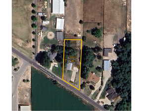Aerial overview of property's location with property boundaries highlighted