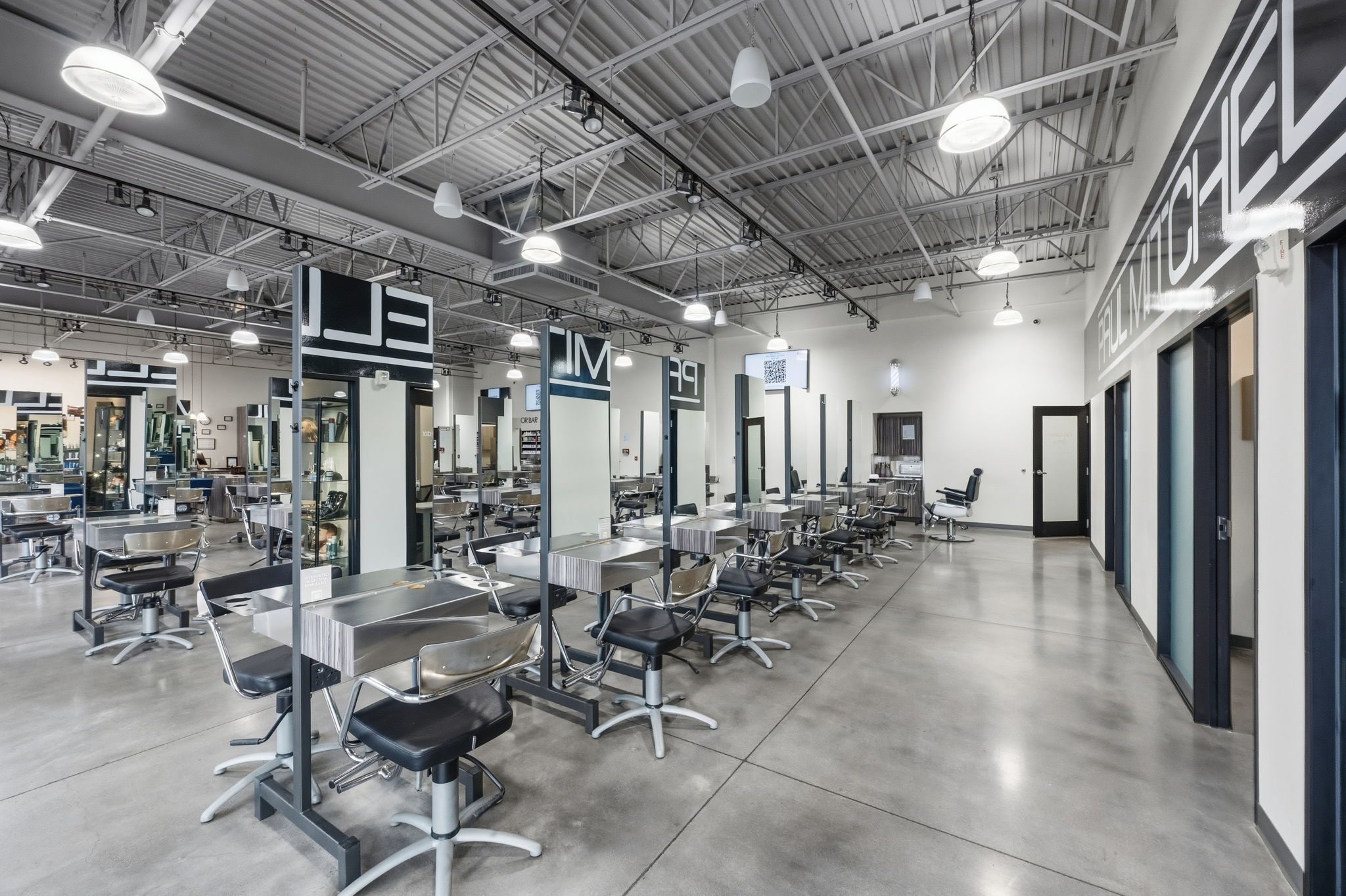 Workout area with a towering ceiling