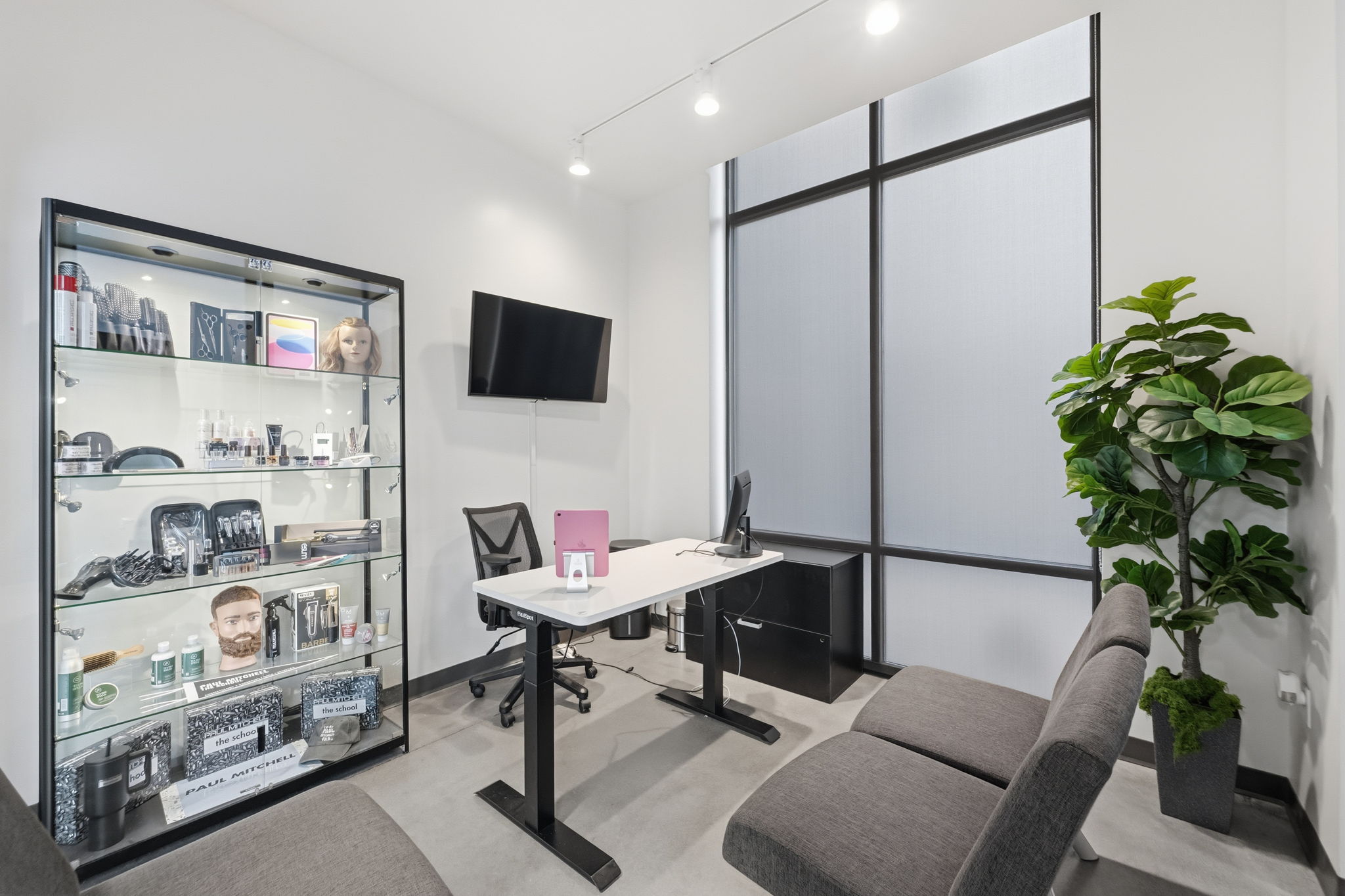 Office space featuring rail lighting