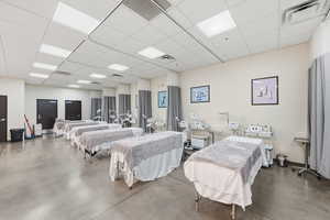 Miscellaneous room featuring a paneled ceiling