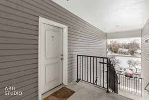 Entrance to property with covered porch
