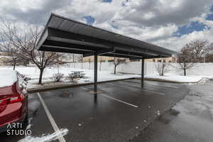 Snow covered parking with covered parking