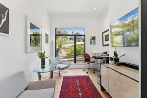 Office featuring plenty of natural light and light wood finished floors