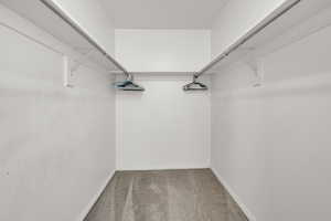 Spacious primary walk-in closet