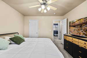 Bedroom featuring carpet floors and a ceiling fan