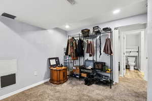 Bedroom featuring carpet floors and recessed lighting