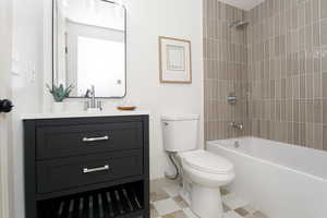 Bathroom featuring vanity and bathtub / shower combination