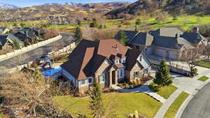Aerial view of residential area with a mountainous background