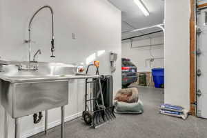 Miscellaneous room with a sink