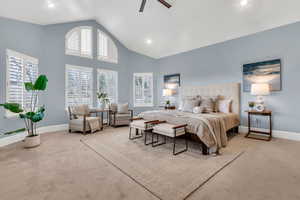 Bedroom with high vaulted ceiling, carpet floors, a ceiling fan, and recessed lighting