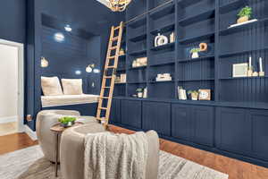 Sitting room featuring wood finished floors