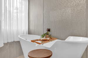 Full bath featuring a freestanding bath