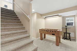 Rec room with carpet flooring and recessed lighting