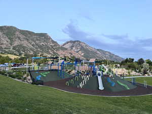 Community jungle gym featuring a mountain view