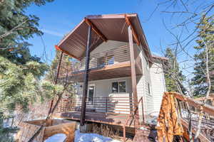 Front of home featuring a Trex deck