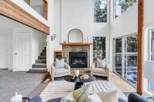 Living area with vaulted ceiling and  fireplace