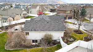 Aerial perspective of suburban area with a mountain backdrop