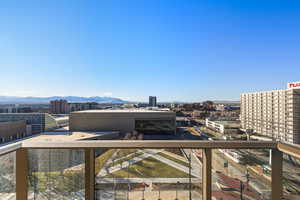 Balcony featuring a city view and a mountain view