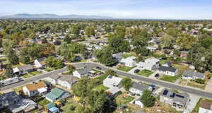 View of property location with nearby suburban area