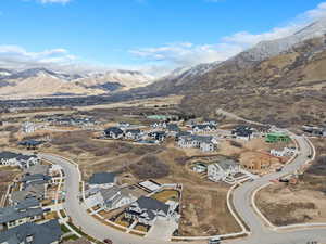 Aerial view of property's location featuring nearby suburban area