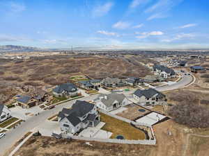 View of property location with nearby suburban area