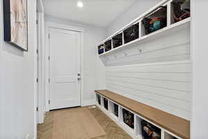 Mudroom featuring baseboards