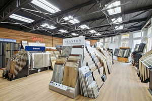 Miscellaneous room featuring wooden walls