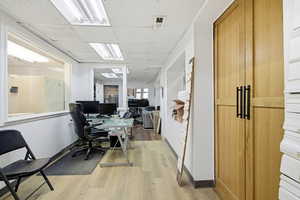 Home office with a drop ceiling