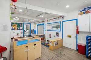 Recreation room featuring recessed lighting