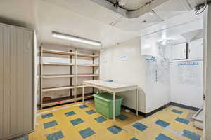 Basement with light flooring