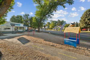 Community play area with a patio area