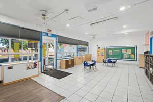 Misc room with a ceiling fan