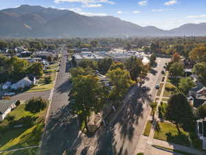 View of property location featuring a mountain backdrop and nearby suburban area